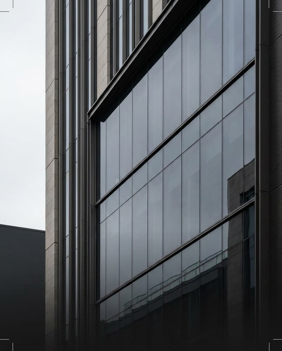 Architectural gallery image showing premium tinted facade glazing with refined reflections
