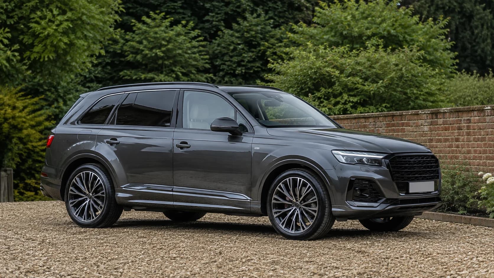 Illustrative graphite SUV with darker rear window tint