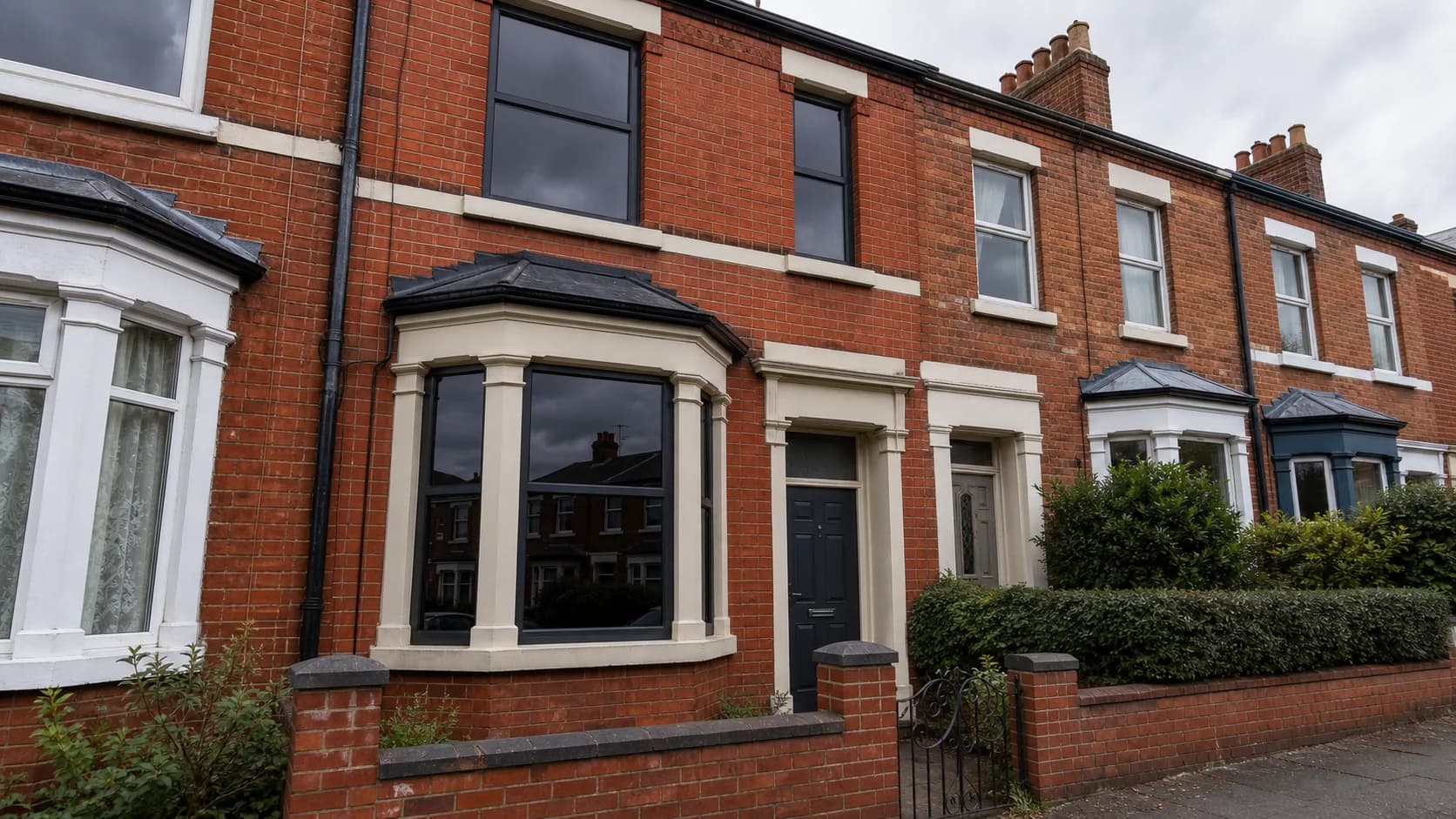 Residential bay window with a clean privacy film finish