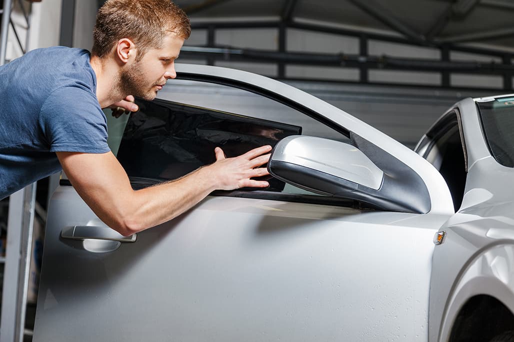 Applying tinting foil