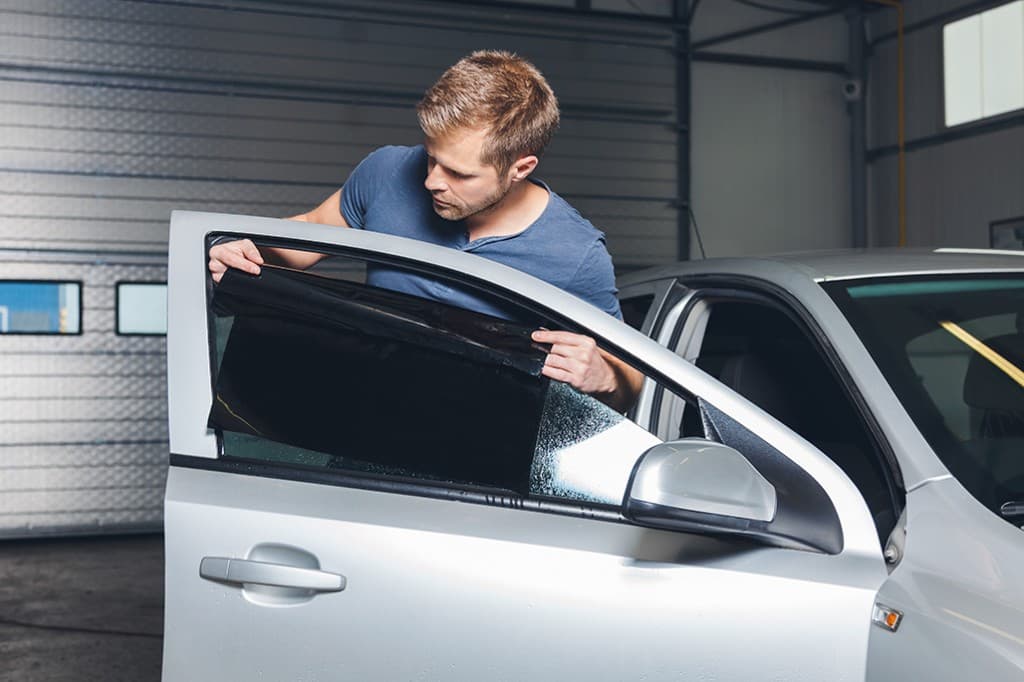 Applying tinting foil