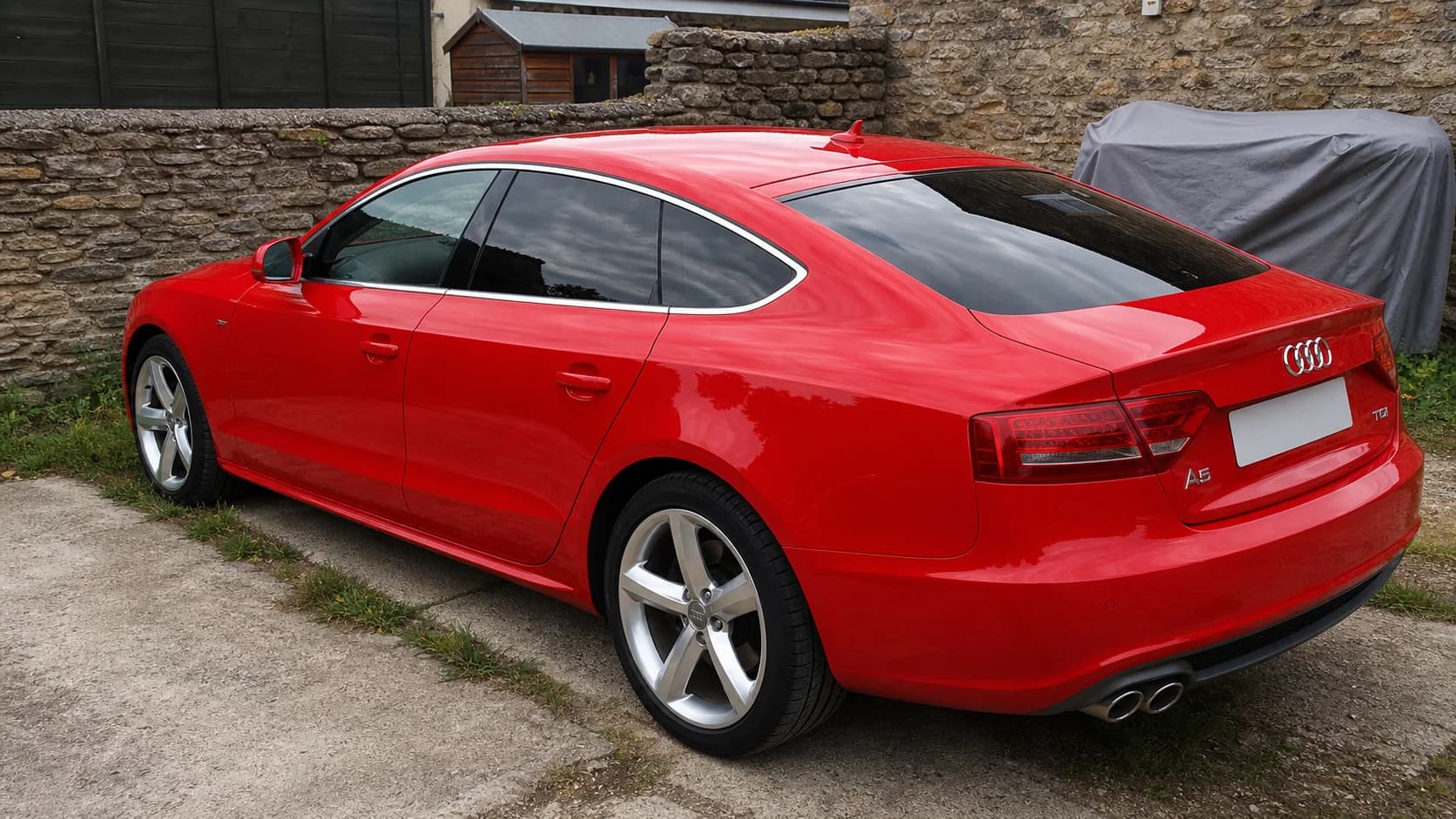 Tinted coupe side profile with dark rear glass